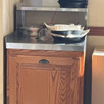 Kneaders Bakery & Cafe - a kitchen with a stove, sink, and dishwasher - Bakeries Near Me - Heber, Utah