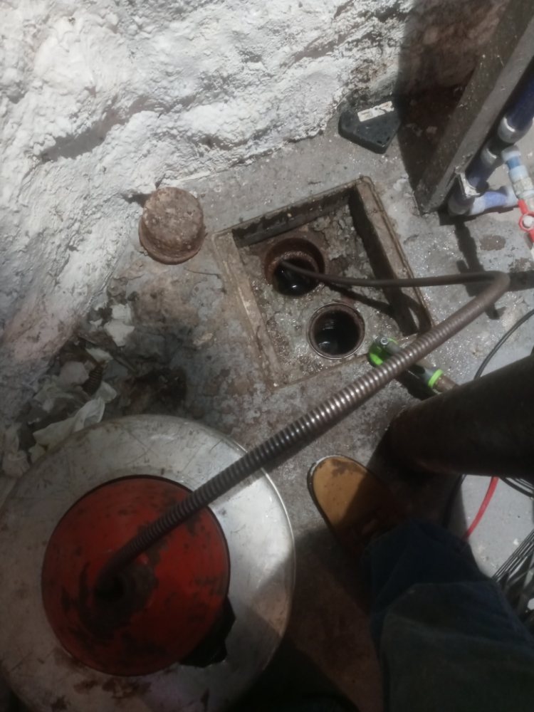 Slide of Main Street Drain Cleaning