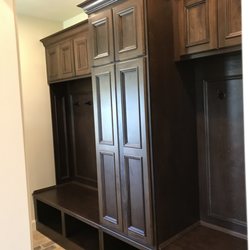 Custom Corners - Bench seat with coat storage in the middle.