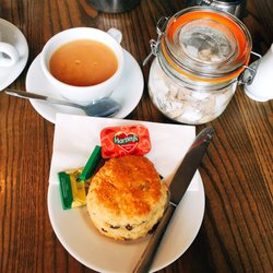 Daisy's Cafe - Scone with butter and jam Breakfast tea!