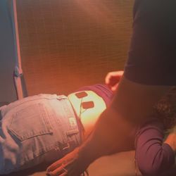 Gutierrez Chiropractic - Therapeutic electrical stimulation pads placed on the lower back combined with soothing heat therapy. Used to help reduce muscle tension,