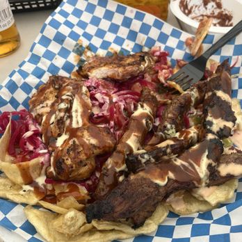 El Olanchano Kitchen - Asado Olanchano $30.00 Chuleta de cerdo, res y pollo asado, servidas con tajadas de banana verde frita, chimol encurtido, salsa BBQ y - Honduran Near Me - San Jose, California