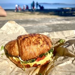 The Birdhouse -West Seattle - Breakfast style sandwich w/ roasted tomatoes, spinach, & feta.