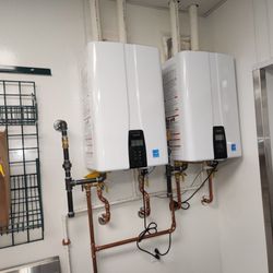 AK Plumbing HVAC Electrical & Restoration - Tankless hot water installation
