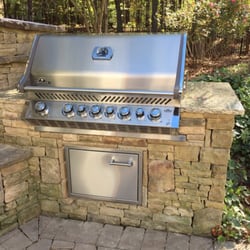 North Atlanta Fireplace, Grill & Patio - If this was a car, I'd never drive it in the rain!  The darker stone is the original that will lighten once I clean it!