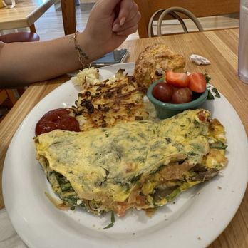 Skillets Restaurant - The goat cheese and veggie omelette with Skillets potatoes and a cranberry orange scone. - Breakfast & Brunch Near Me - Wellington, Florida