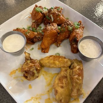 Dubs Sports Lounge - Buffalo and garlic parm wings. The ranch dressing seems homemade. Really good! - Sports Bars Near Me - Reno, Nevada Dubs Sports Lounge - Buffalo and garlic parm wings. The ranch dressing seems homemade. Really good! - Sports Bars Near Me - Reno, Nevada