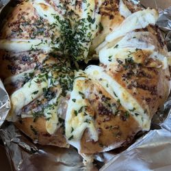Khairos Coffee - Stuffed Bagel with cream cheese and chives. Sooo good.