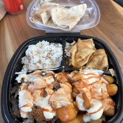 Pita Thyme - BEEF SHAWARMA PLATE with potatoes, rice, hummus and their 3 sauces added.
