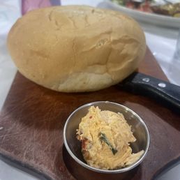 Bread w/butter. No idea what the butter is, but it is Amazing! Bread w/butter. No idea what the butter is, but it is Amazing!