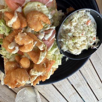 Stormrunners Tavern - Shrimp Po' boy was big but had little flavor - Tiki Bars Near Me - Gulfport, Florida Stormrunners Tavern - Shrimp Po' boy was big but had little flavor - Tiki Bars Near Me - Gulfport, Florida