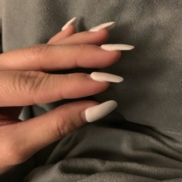 Powder dip nail.  This was after my wedding so this pic is with nail growth, but you can still see how uneven and thick it is.