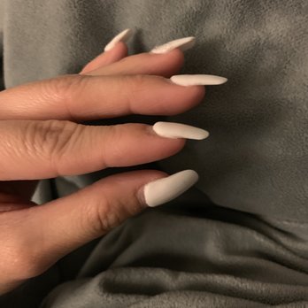 Nails By Lily - Powder dip nail.  This was after my wedding so this pic is with nail growth, but you can still see how uneven and thick it is. - Nail Salons Near Me - Missouri City, Texas