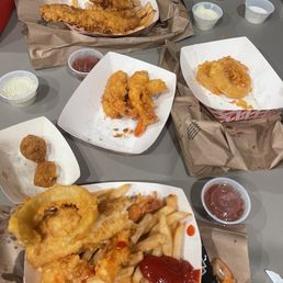 Fish and shrimp combo, hush puppies, onion rings Fish and shrimp combo, hush puppies, onion rings