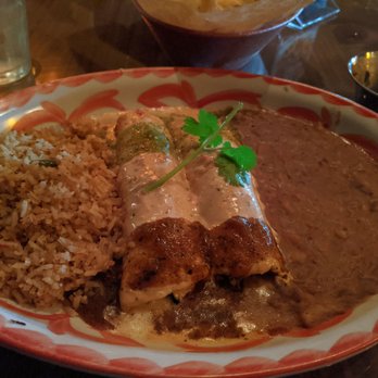 Lupe Tortilla Mexican Restaurant - Spinach and artichoke enchiladas. The refried beans are not vegetarian. - Mexican Near Me - Houston, Texas Lupe Tortilla Mexican Restaurant - Spinach and artichoke enchiladas. The refried beans are not vegetarian. - Mexican Near Me - Houston, Texas