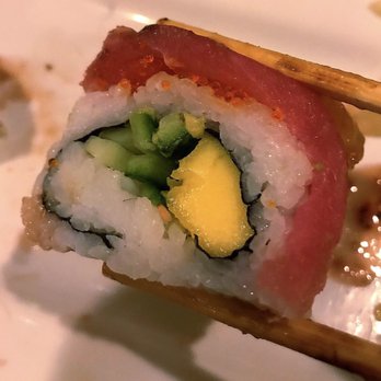 Umi Sake House - Tropical Paradise: strawberry, mango, avocado, cucumber, topped with tuna, salmon, tobiko, drizzled with blueberry soy glaze - Sushi Bars Near Me - Seattle, Washington