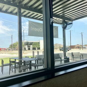 Starbucks - Outdoor patio with circulating fans will be nice when it's cooler - Coffee & Tea Near Me - Sanger, Texas