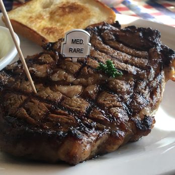 T-Bone Tom's - 14 oz Ribeye marinated , med-rare - Barbeque Near Me - Kemah, Texas