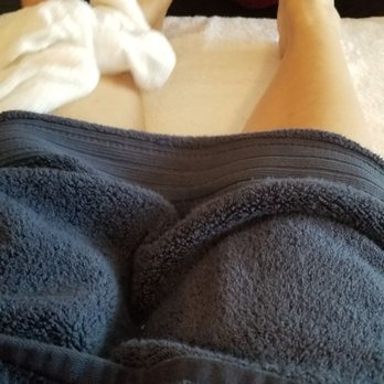 Relax Reflexology - Lucy finishing up and cleaning my feet. - Reflexology Near Me - Albuquerque, New Mexico