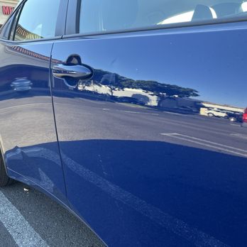 California Dent Co. Paintless Dent Removal - Car door with dent and light paint transfer. - Mobile Dent Repair Near Me - Tustin, California