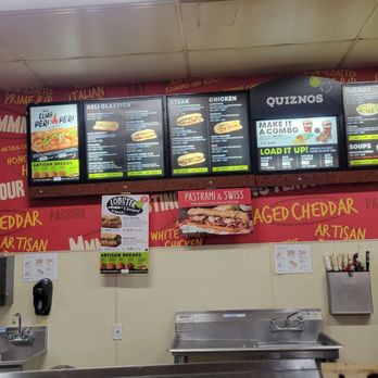 Quiznos - menus on the wall of a fast food restaurant - Sandwiches Near Me - Richmond, California Quiznos - menus on the wall of a fast food restaurant - Sandwiches Near Me - Richmond, California