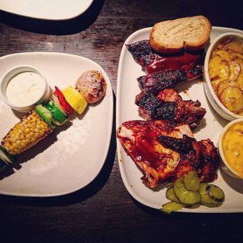 Jack Stack Barbecue - Freight House - Sampler ~ BBQ chicken, pork spare ribs, burnt ends, cheesy potato bake & cheesy corn bake (+ a vegetable kabob on the side). - Barbeque Near Me - Kansas City, Missouri