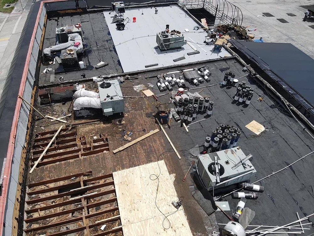 Slide of TJ Platinum Roofing