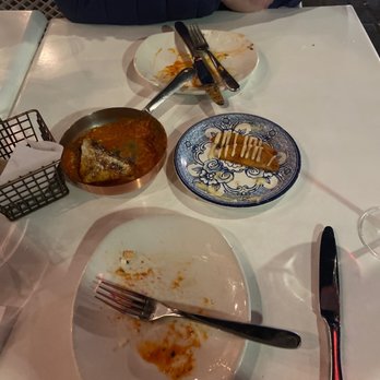 AMBAR Restaurant, Clarendon - Fries and lasagna! Of the many small plates we got! Sorry about that random blur? - Modern European Near Me - Arlington, Virginia