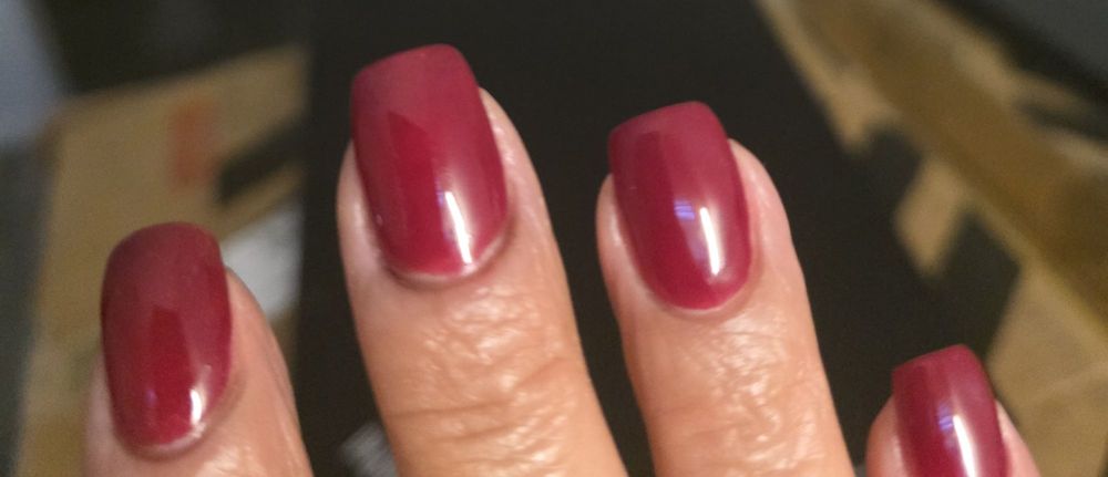 Nails of the World & Spa Logo