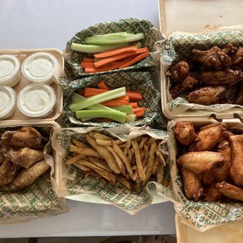 Wingstop - Lemon Pepper on the bottom left, Mild on bottom right, Spicy Korean Q on top right. Veggie sticks and seasoned fries in the middle. - Chicken Wings Near Me - Rosemead, California Wingstop - Lemon Pepper on the bottom left, Mild on bottom right, Spicy Korean Q on top right. Veggie sticks and seasoned fries in the middle. - Chicken Wings Near Me - Rosemead, California