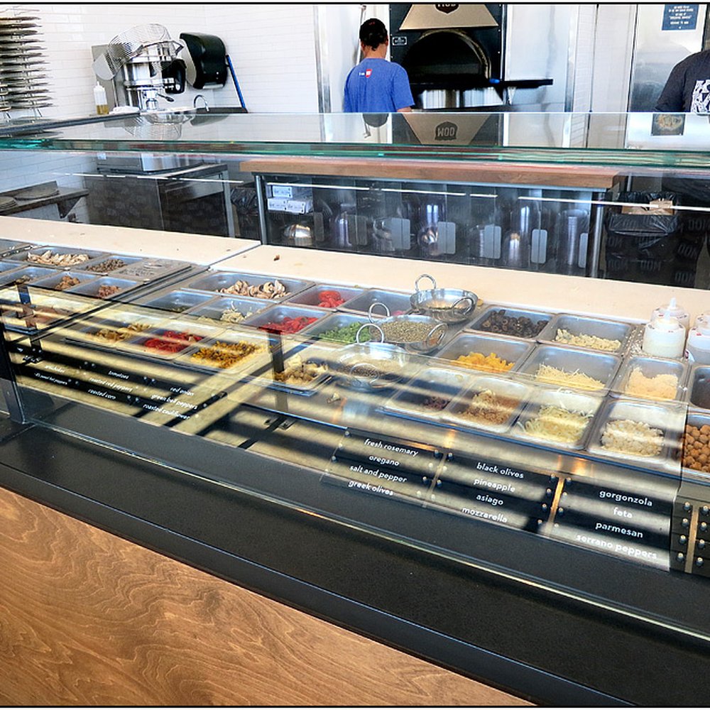 MOD Pizza - Toppings bar, works like Subway. Couldn't avoid reflection from windows. She's maybe the sweetest girl in the world. - Fast Food Near Me - Houston, Texas MOD Pizza - Toppings bar, works like Subway. Couldn't avoid reflection from windows. She's maybe the sweetest girl in the world. - Fast Food Near Me - Houston, Texas