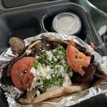 Batman Grill - Gyro with extra tzatziki - Middle Eastern Near Me - Muncie, Indiana Batman Grill - Gyro with extra tzatziki - Middle Eastern Near Me - Muncie, Indiana