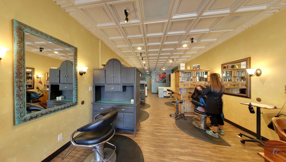 Marcie Binns at Marcie Loewe Hairstyling Logo