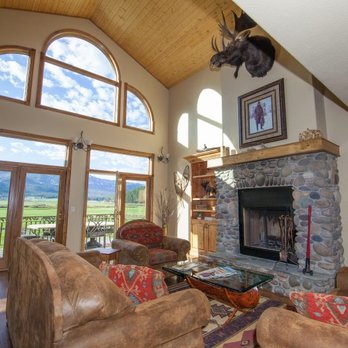 Star Valley Lodge - Our Great Room, featuring floor to ceiling windows and a wood burning fireplace. - Venues & Event Spaces Near Me - Bedford, Wyoming Star Valley Lodge - Our Great Room, featuring floor to ceiling windows and a wood burning fireplace. - Venues & Event Spaces Near Me - Bedford, Wyoming