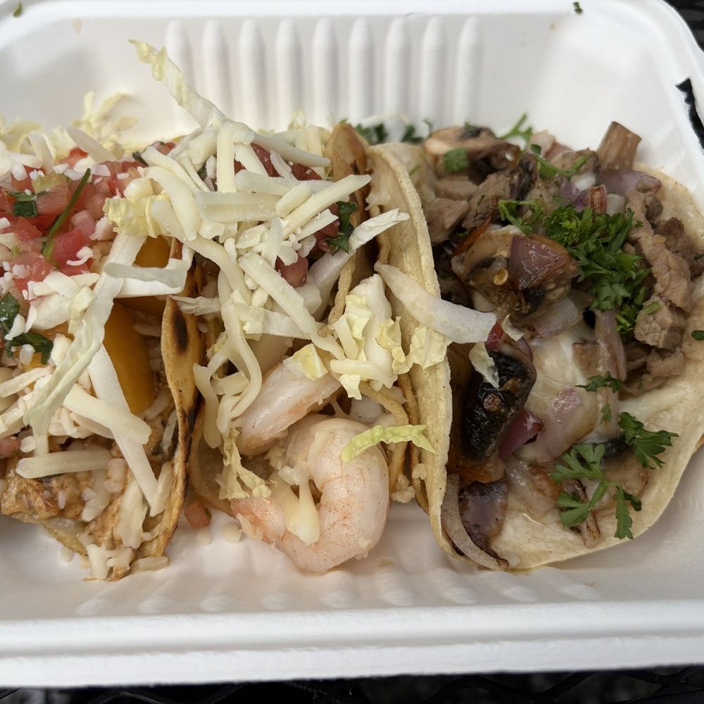 Roadrunner Grill - (Left to right): Chipotle Chicken and Mango Taco, Butter Garlic Shrimp Taco, speciality "Dippy" Taco. - Food Trucks Near Me - Cottonwood, California Roadrunner Grill - (Left to right): Chipotle Chicken and Mango Taco, Butter Garlic Shrimp Taco, speciality "Dippy" Taco. - Food Trucks Near Me - Cottonwood, California
