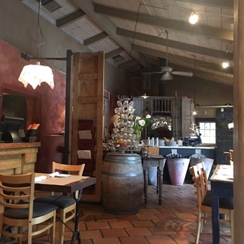 Corkscrew Cafe - brick oven, wine selection, front entrance with sliced parma ham - American Near Me - Carmel Valley, California