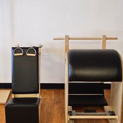 Anointed Hands Massage and Pilates Studio - Pilates apparatus - arm chair and ladder barrel