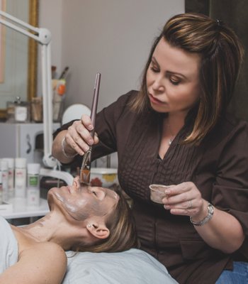 Exfoliation and Peels, and Trilift- Non Surgical Facelift - Relaxation and renewal awaits you at FACES of Saratoga. Established in 2017 to bring a truly holistic approach to modern skin concerns, we concentrate on your body as a whole to bring you lasting, healthy and beautiful results. Our skilled and passionate licensed estheticians focus on your specific skin concerns while blending olde-world remedies with botanicals and modern, scientific alchemy. We specialize in skin sensitivity, acne, loss of vibrancy, aging skin and stress related conditions including menopausal skin and rosacea. We create a personalized and custom treatment protocol and use organic, vegan, Eco-Certified and COSMOS Certified professional skin care. We offer fully customized facials, micro-needling, nutrition, dermaplaning, waxing, gua sha and reflexology, we're committed to helping you look and feel your best. We offer Saratoga’s only triLift (non-surgical facelift) and we’re the first to offer the GeneoX Glo2Facial…Hollywood’s Go To facial that’s fast, effective and super affordable! Schedule a session today, and discover the difference individualized care can make in your skin health and beauty.