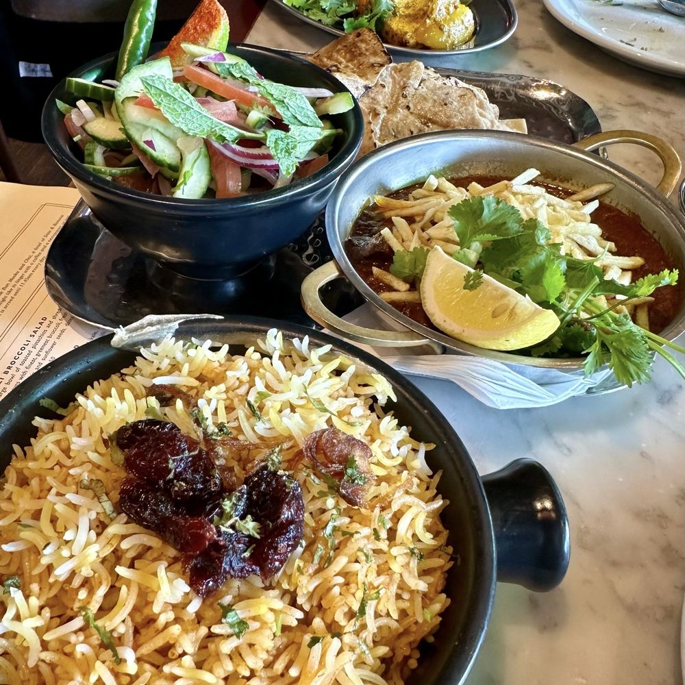 Dishoom - Chicken biryani, Chef's Edinburgh special is out roti (half plate), cucumber salad, and paneer tikka - Indian Near Me - Edinburgh, EDH Dishoom - Chicken biryani, Chef's Edinburgh special is out roti (half plate), cucumber salad, and paneer tikka - Indian Near Me - Edinburgh, EDH