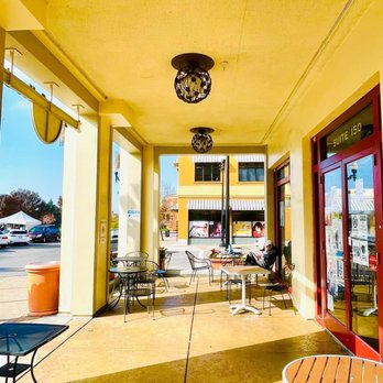 Evergreen Coffee - a patio with tables and chairs - Breakfast & Brunch Near Me - San Jose, California Evergreen Coffee - a patio with tables and chairs - Breakfast & Brunch Near Me - San Jose, California