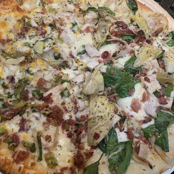 Papa Murphy's - Right side: Garlic Chicken and Left: Chicken Bacon Artichoke - Pizza Near Me - Vancouver, Washington Papa Murphy's - Right side: Garlic Chicken and Left: Chicken Bacon Artichoke - Pizza Near Me - Vancouver, Washington