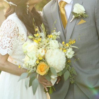 In Its Time - Wedding garden bouquet in creams/whites/yellows and a single white rose boutonniere with wax flowers - Florists Near Me - San Marino, California In Its Time - Wedding garden bouquet in creams/whites/yellows and a single white rose boutonniere with wax flowers - Florists Near Me - San Marino, California