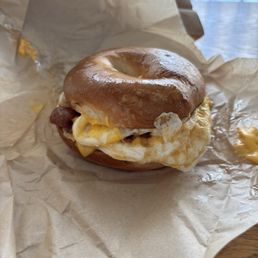 Bacon egg and cheese. Dunkin is a huge corporate chain, unfortunately this bacon egg and cheese tastes identical for double the price. Bacon egg and cheese. Dunkin is a huge corporate chain, unfortunately this bacon egg and cheese tastes identical for double the price.