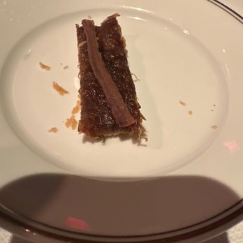 Le Coucou - It does not look appetizing, but this is actually very good. Caramelized onion biscuit - French Near Me - New York, New York Le Coucou - It does not look appetizing, but this is actually very good. Caramelized onion biscuit - French Near Me - New York, New York