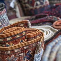 Antique Oriental Rugs Center - Antique Oriental Rugs Center (AORC) Oriental rugs rolled 3