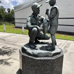 Sea Center Texas - A Fish Story statue in front of Sea Center Texas