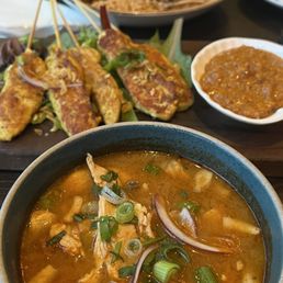 Tom yum soup, chicken satay, pad Thai Tom yum soup, chicken satay, pad Thai