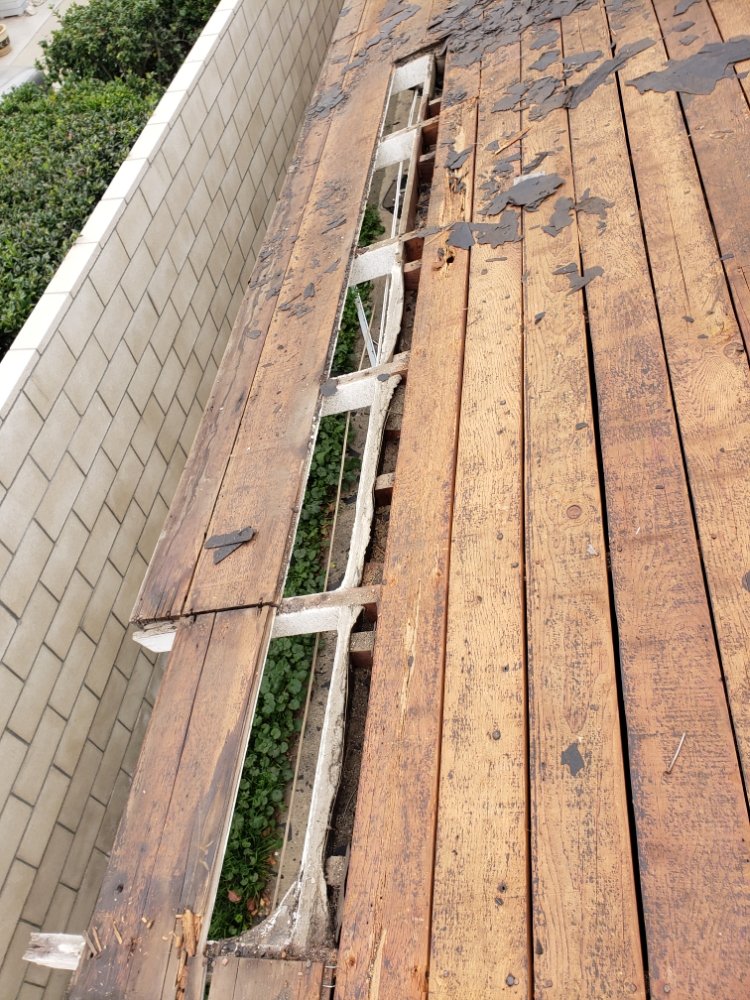 Slide of Gerardo roofing