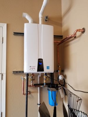 Photo of Pridemark Plumbing - Surprise, AZ, US. New Navien 180A w peak flow anti scale unit.