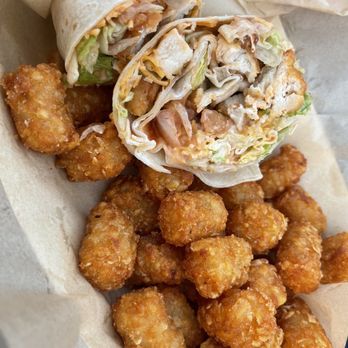 Mascots - Buffalo Crispy Chicken Wrap with Tots. It was simple and perfect. 10/10 - Sports Bars Near Me - Saint Peters, Missouri Mascots - Buffalo Crispy Chicken Wrap with Tots. It was simple and perfect. 10/10 - Sports Bars Near Me - Saint Peters, Missouri